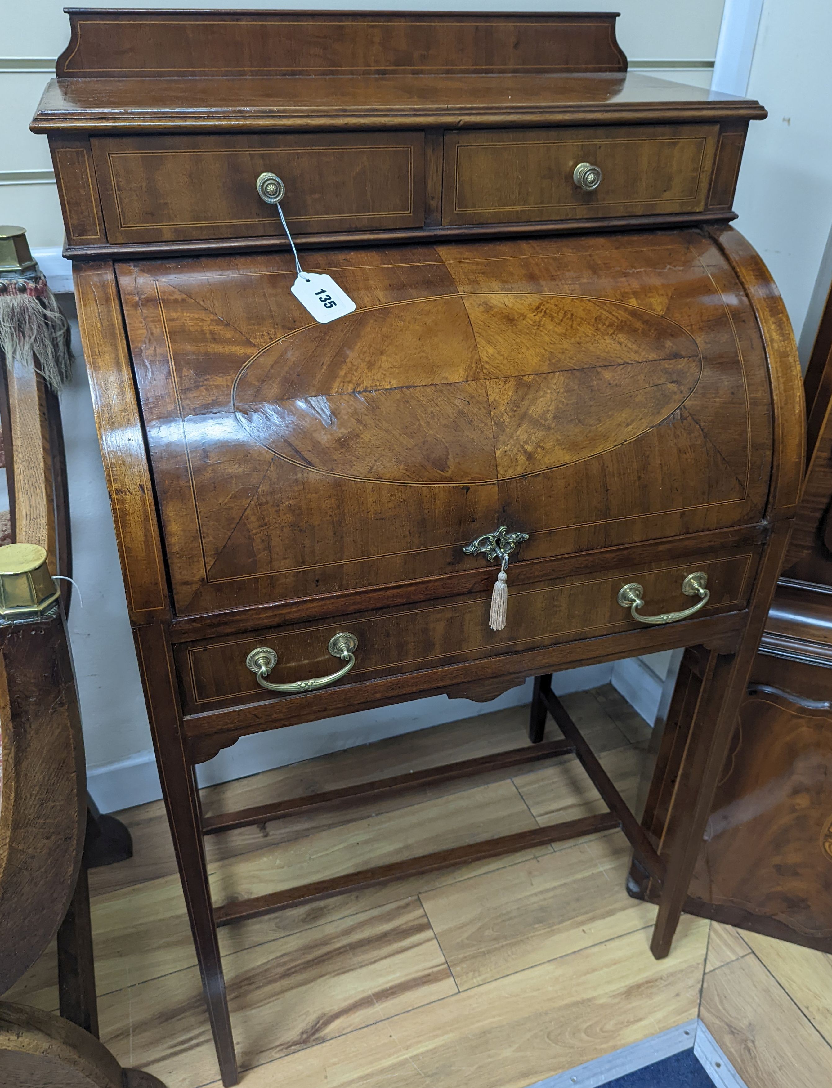 An Edwardian mahogany cylinder bureau, width 64cm, depth 45cm, height 110cm